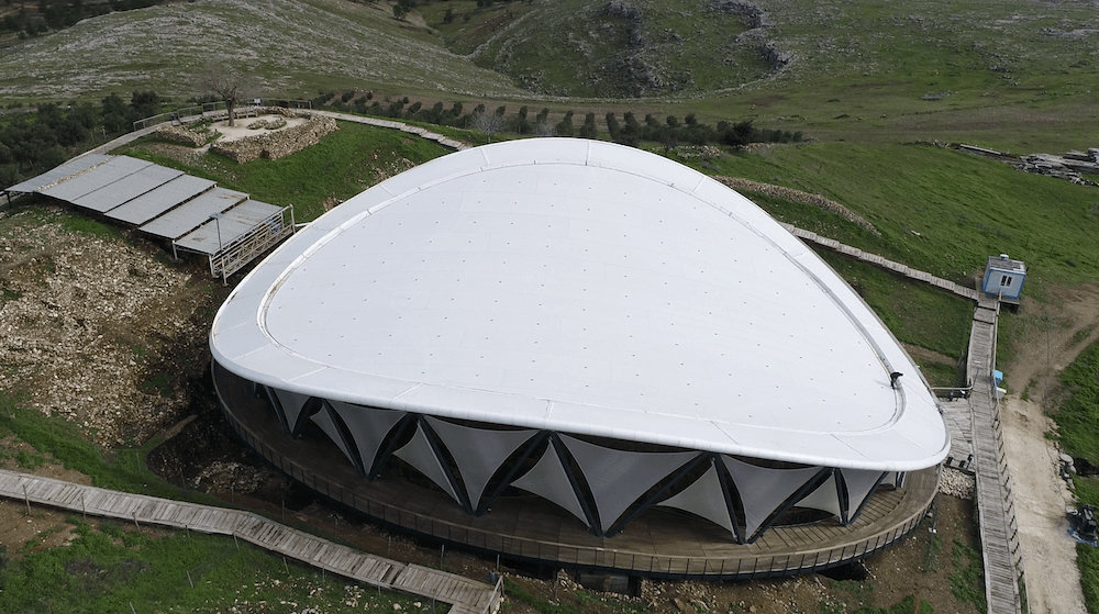 Aerial view of Göbekli Tepe with protective dome structure