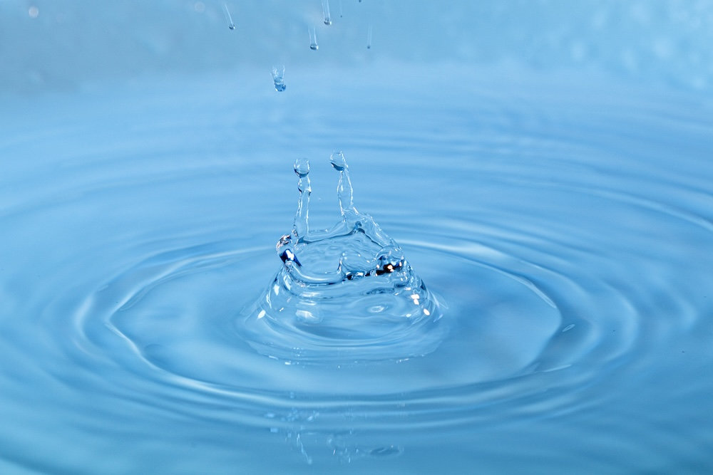 Water droplets creating ripples