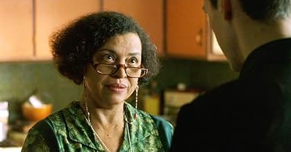 The Oracle with Neo in her apartment